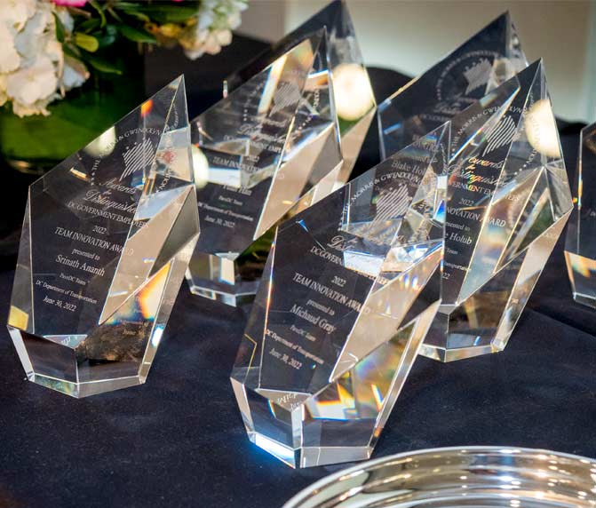 Closeup of a group of Crystal Engraved Cafritz Awards.